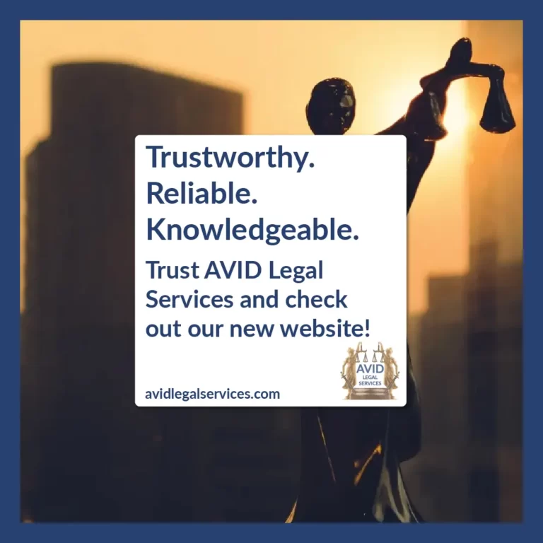 lady justice statue in front of a downtown sunset